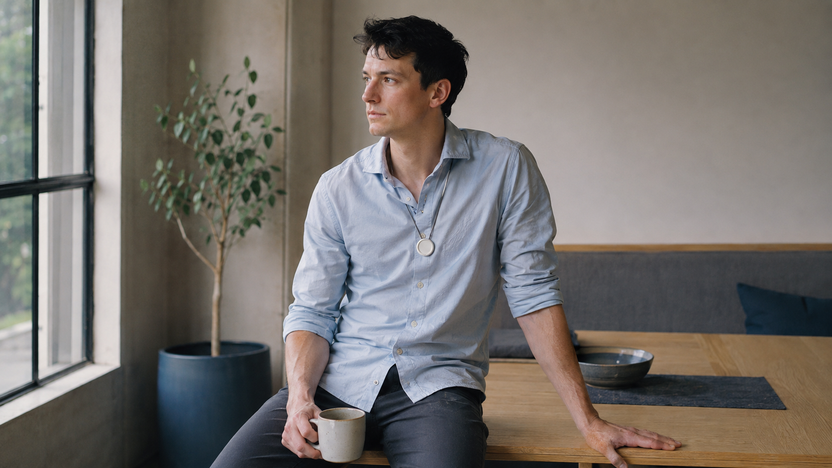 Illustrative scene: a man wearing ACTRA in a light-filled workspace
