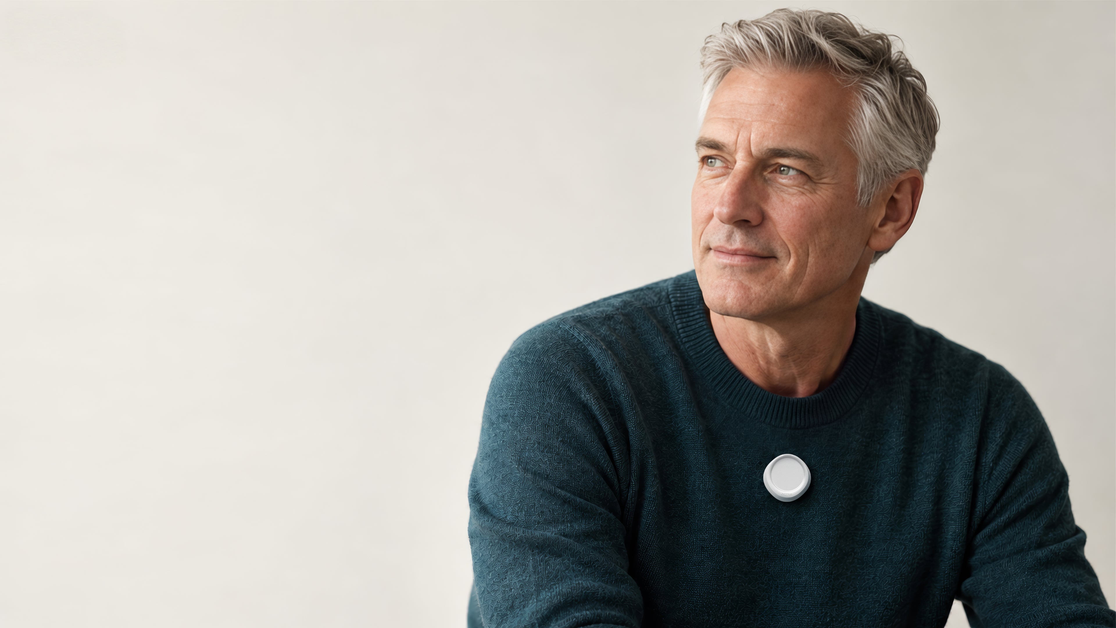 A man wearing a pearl-white ACTRA, looking ahead